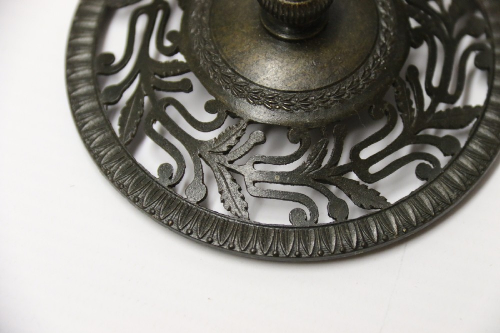 An Empire period dark green marble inkstand featuring dark patinated bronze cherub figures, twin urn inkwells, and carved claw feet. View XIII