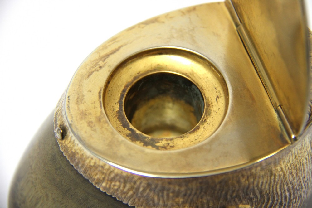 An antique Edwardian horse hoof inkwell featuring an intricately engraved hinged silver-gilt lid with foliate scrolls and a dated memorial inscription. View VII