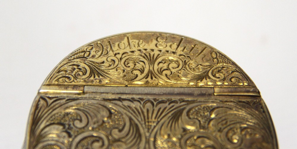 An antique Edwardian horse hoof inkwell featuring an intricately engraved hinged silver-gilt lid with foliate scrolls and a dated memorial inscription. View X