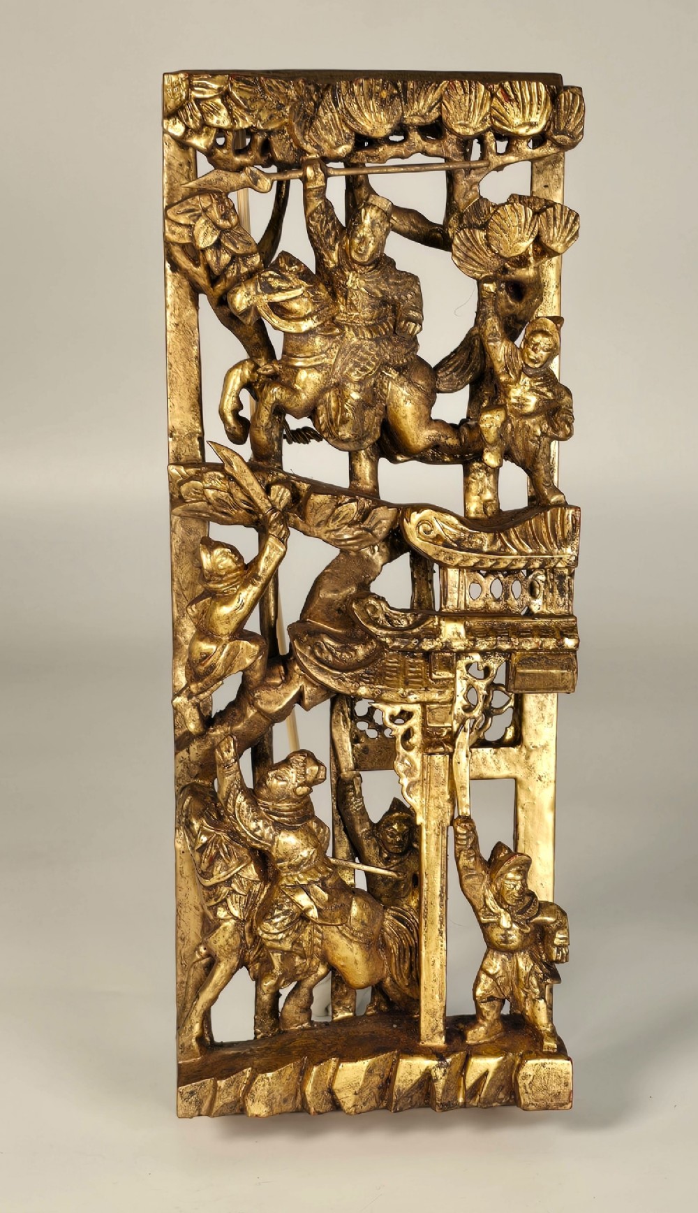 A Chinese carved giltwood wall panel, circa 1900