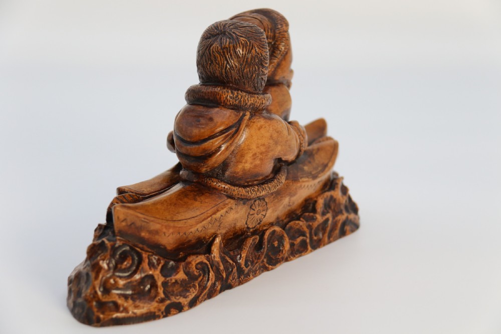 A rare early 20th century Canadian folk art maple wood carved Inuit figure group View IV