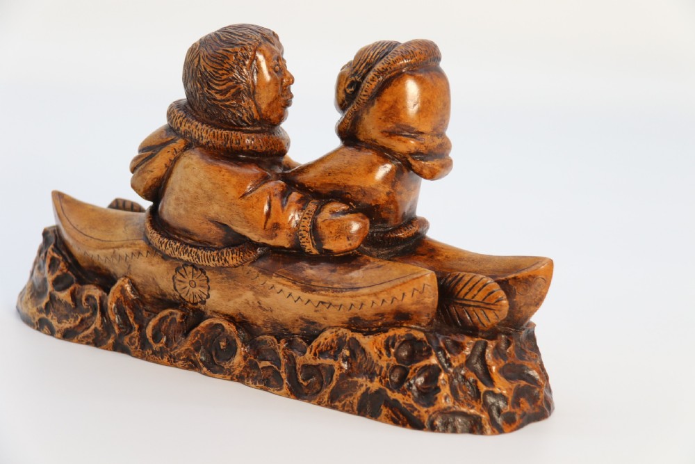 A rare early 20th century Canadian folk art maple wood carved Inuit figure group View VI