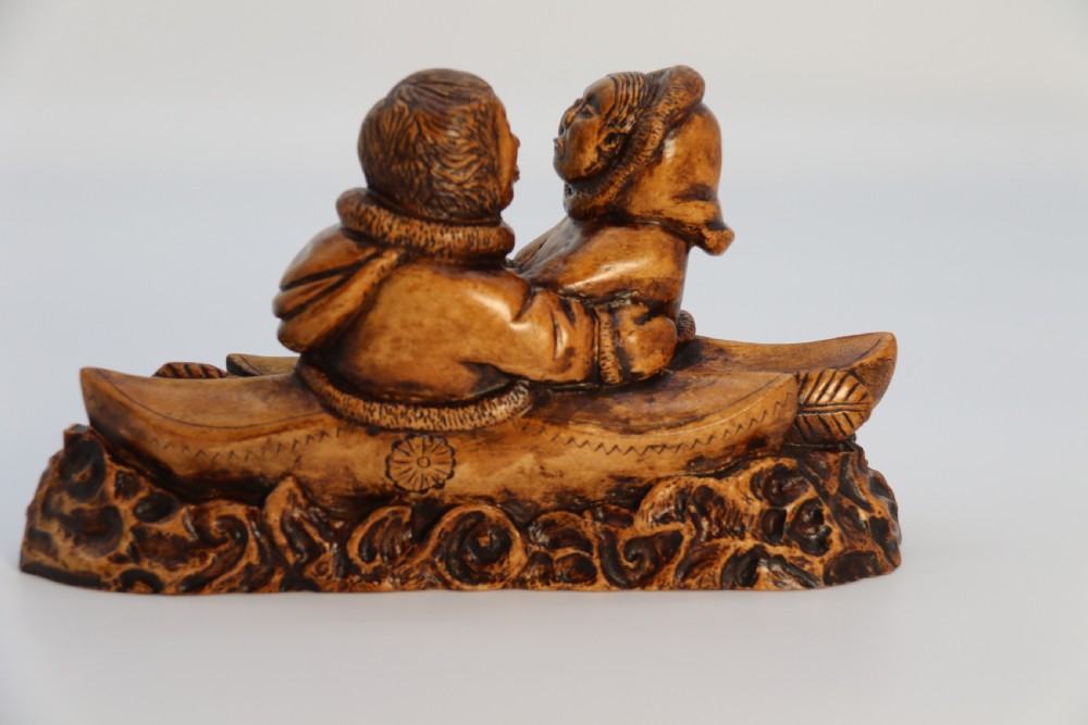 A rare early 20th century Canadian folk art maple wood carved Inuit figure group View VII