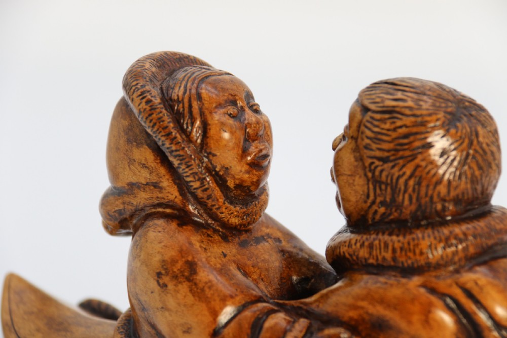 A rare early 20th century Canadian folk art maple wood carved Inuit figure group View IX