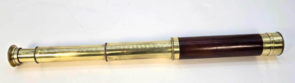 A superb 19th C telescope, pocket sized in brass and mahogany. View VII