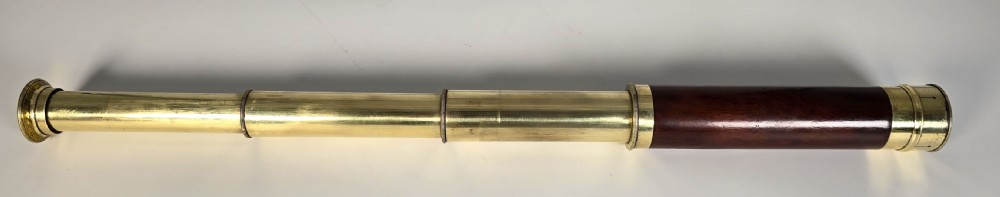 A superb 19th C telescope, pocket sized in brass and mahogany. View IX