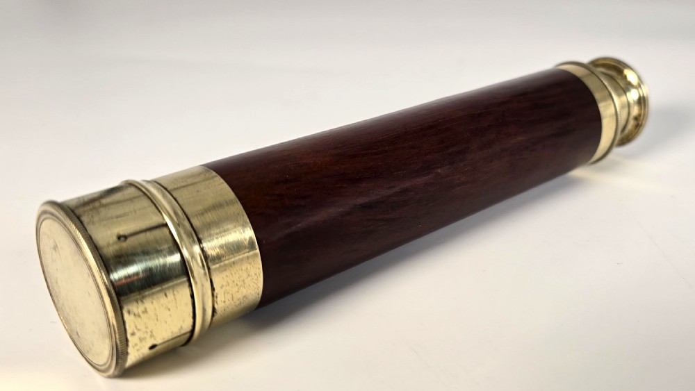 A superb 19th C telescope, pocket sized in brass and mahogany. View XI
