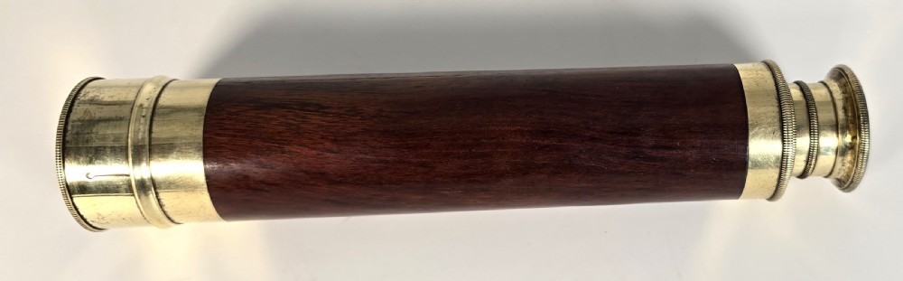 A superb 19th C telescope, pocket sized in brass and mahogany. View XII