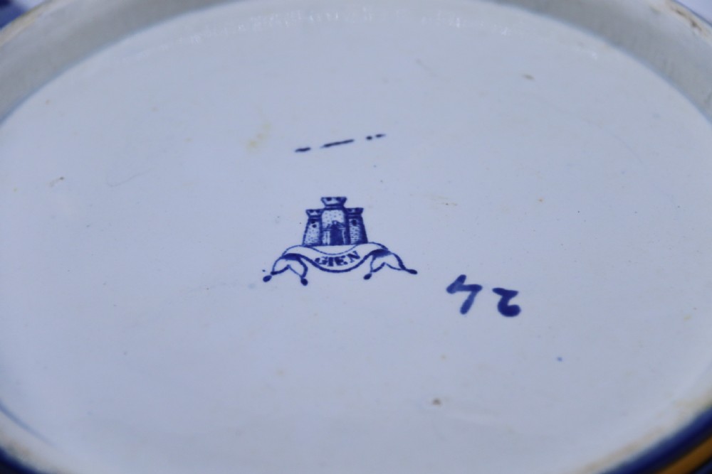 A hand-painted French Gien faience earthenware centrepiece dish with twin handles, decorated in cobalt blue and yellow mythological figures and acanthus scrollwork. View XXII