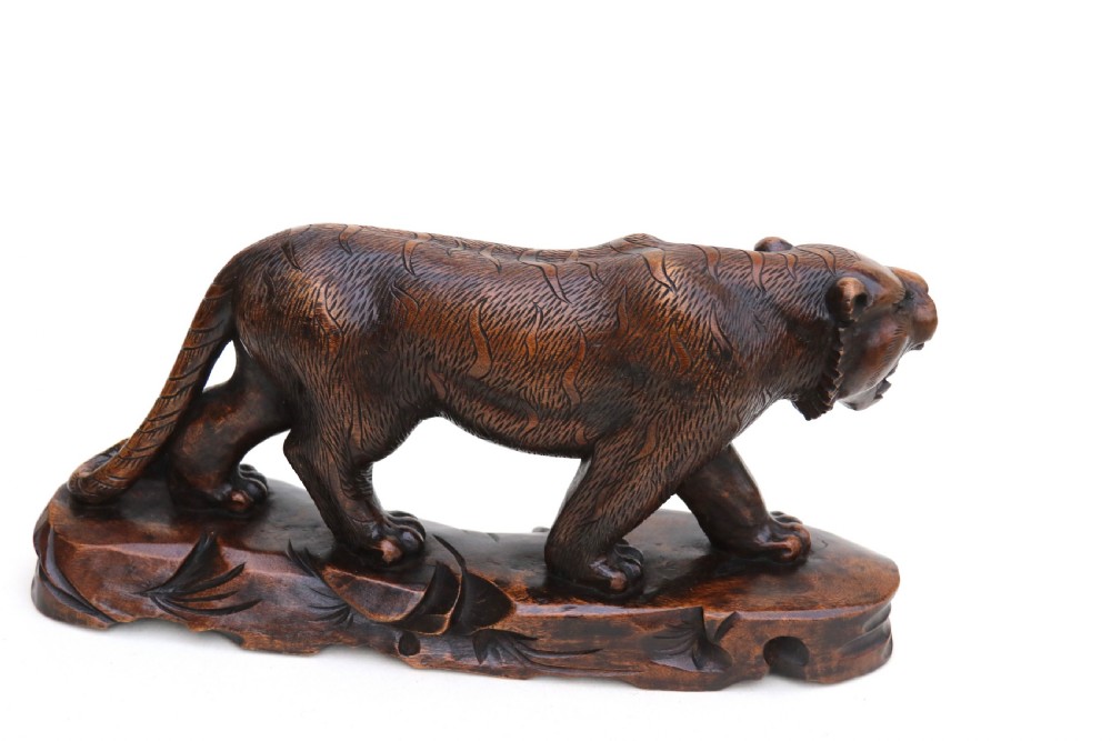 Antique Japanese Meiji period carved hardwood okimono of a prowling tiger. View V