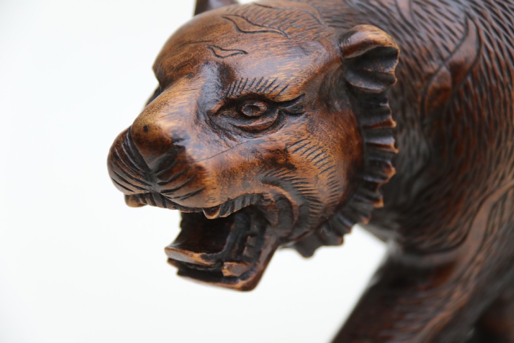 Antique Japanese Meiji period carved hardwood okimono of a prowling tiger. View VII