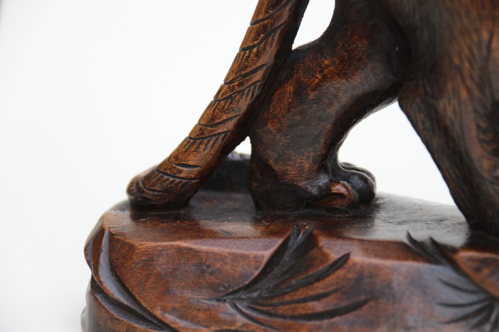 Antique Japanese Meiji period carved hardwood okimono of a prowling tiger. View VIII