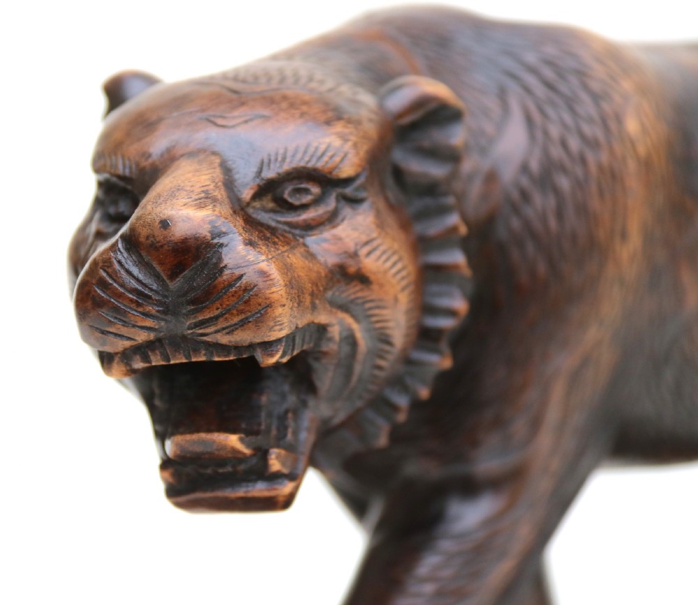 Antique Japanese Meiji period carved hardwood okimono of a prowling tiger. View IX
