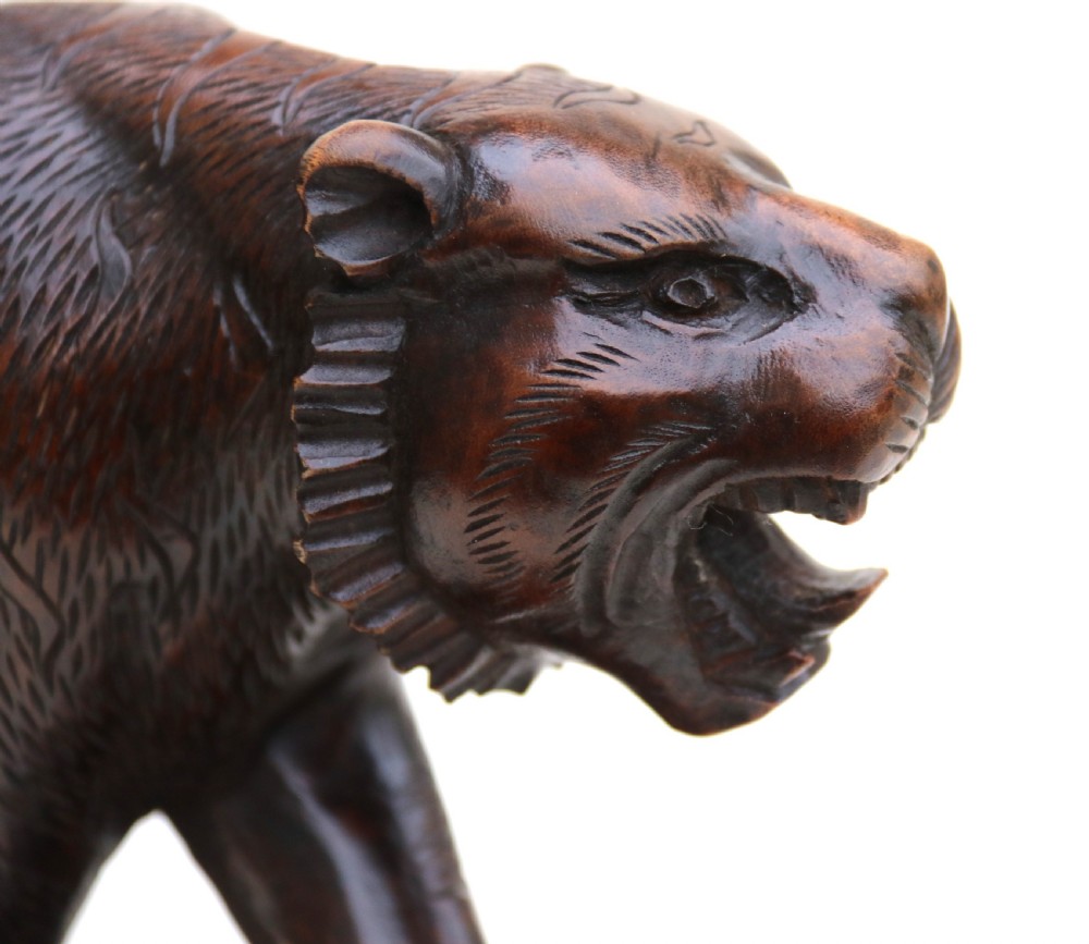 Antique Japanese Meiji period carved hardwood okimono of a prowling tiger. View X
