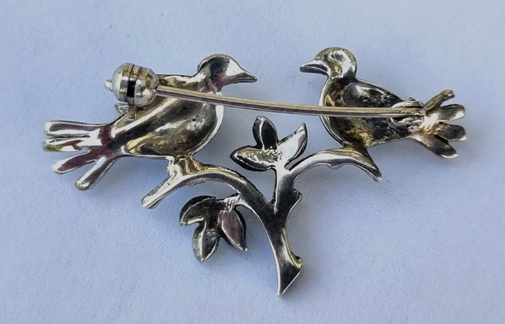 A delightful 1920s lovebirds silver and enamel marcasite set brooch View III