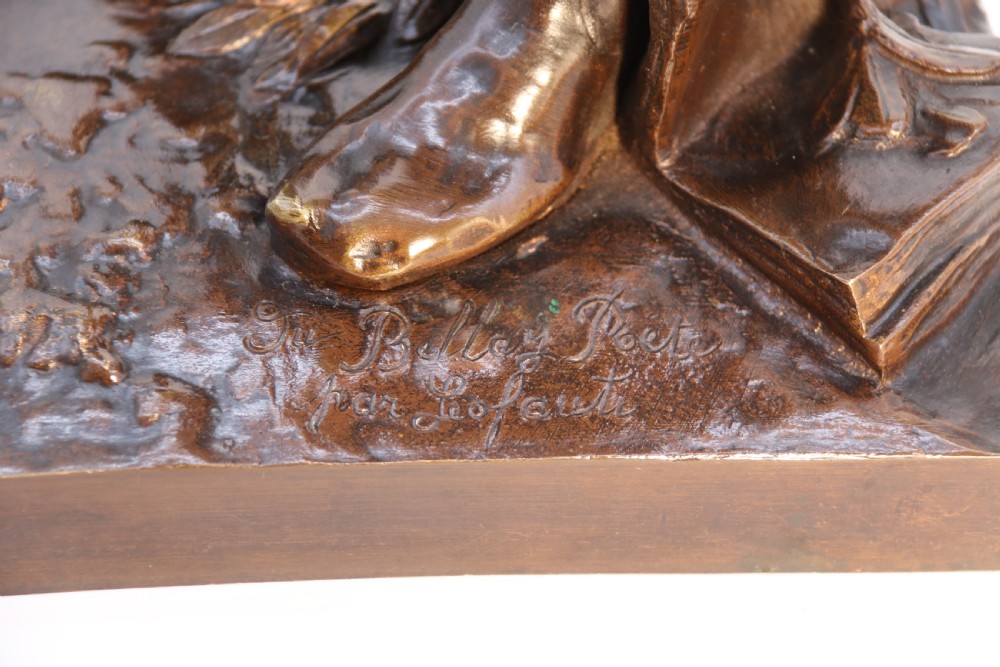 A 19th-century dark patinated bronze figure depicting French poet Joachim de Bellay in 16th-century period costume. View XIV