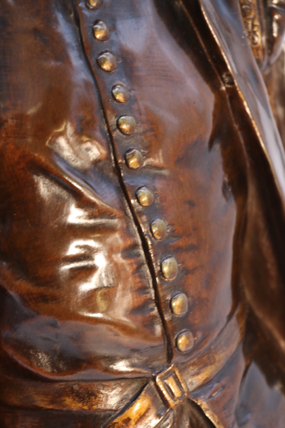 A 19th-century dark patinated bronze figure depicting French poet Joachim de Bellay in 16th-century period costume. View XVII