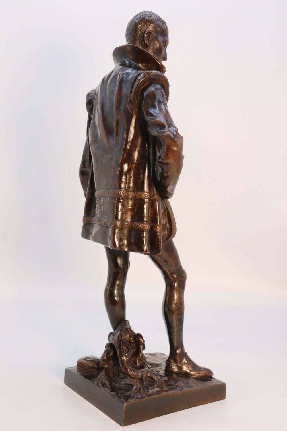 A 19th-century dark patinated bronze figure depicting French poet Joachim de Bellay in 16th-century period costume. View XXIV