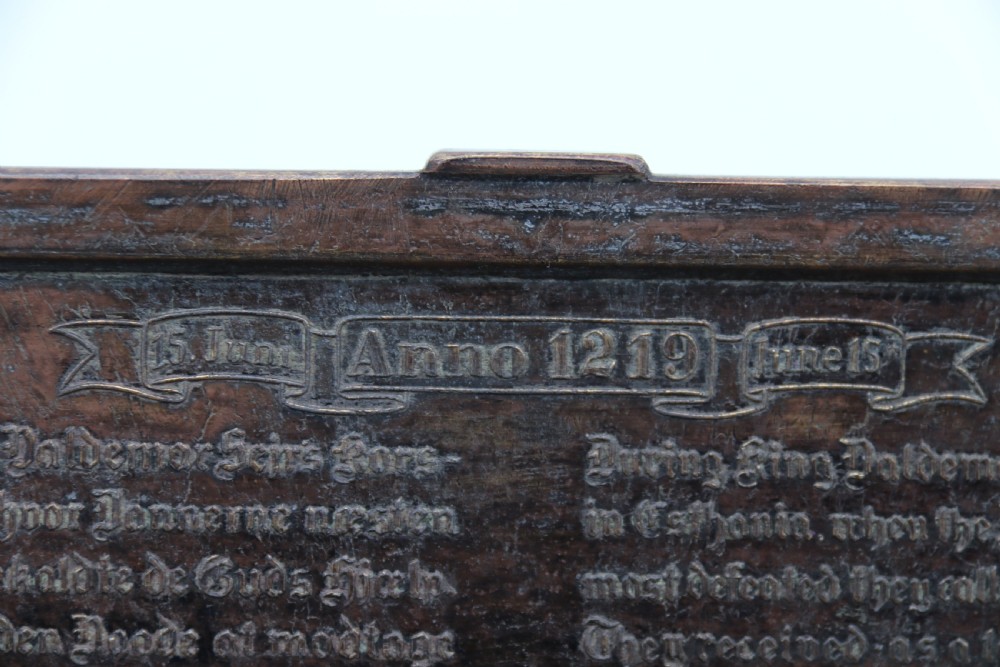 A dark brown patinated cast metal trinket box fashioned in the form of a medieval coffer with relief figures and metal strapwork details. View XVI