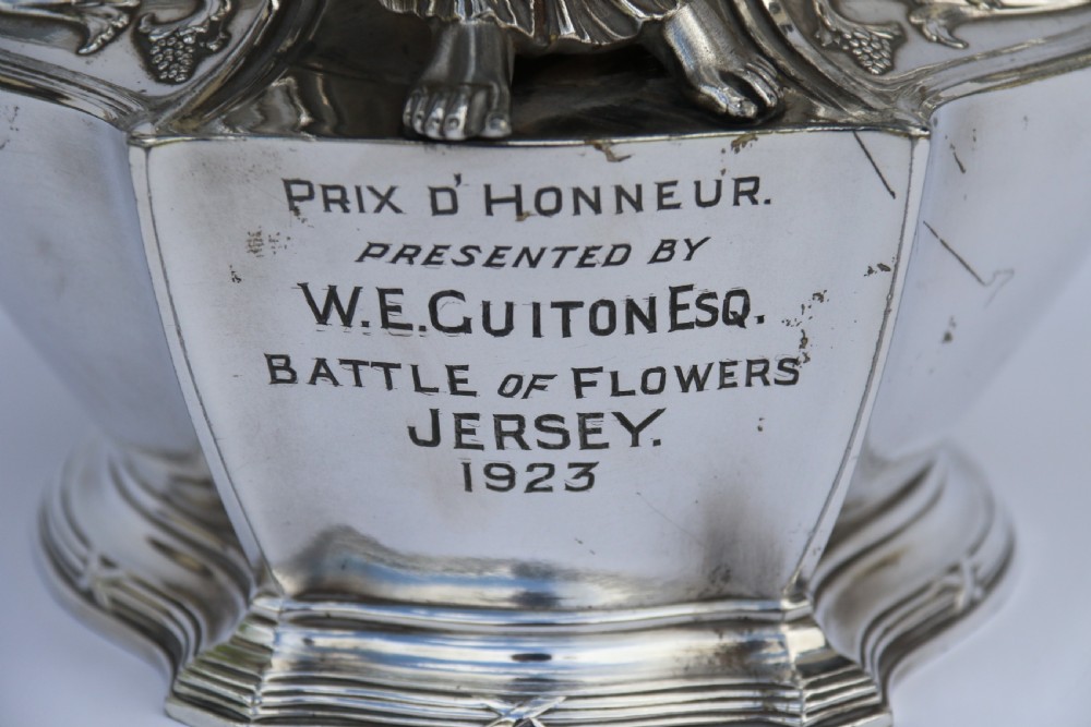 An Art Nouveau silver-plated WMF vase featuring a sculpted maiden figure in relief, sweeping organic handles, and a cut glass rim insert. View II
