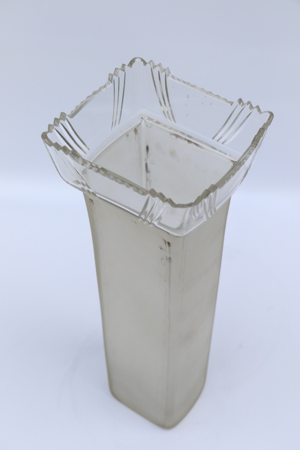 An Art Nouveau silver-plated WMF vase featuring a sculpted maiden figure in relief, sweeping organic handles, and a cut glass rim insert. View XXIX