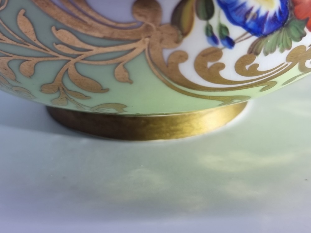 A Chamberlain and Co. Worcester porcelain vase hand painted with a floral display. View XV