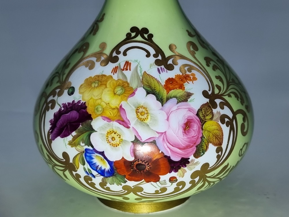 A Chamberlain and Co. Worcester porcelain vase hand painted with a floral display. View XVII