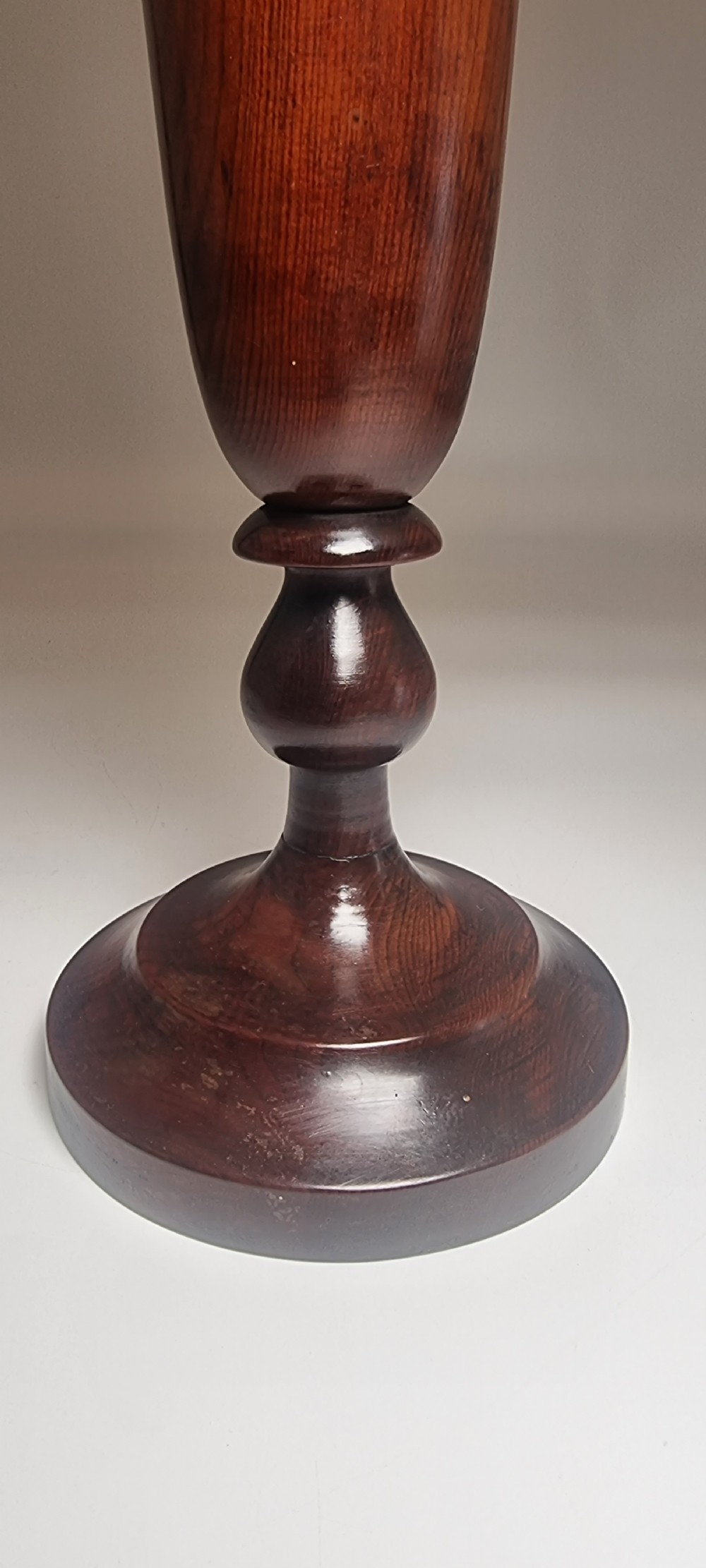 A pair of turned 18th-century yew wood treen vases with flared rims, turned stems, and stepped circular bases. View XXI
