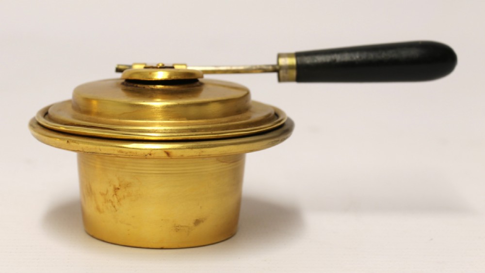 A late 19th-century Aesthetic Movement brass spirit kettle with a cane-wrapped handle, resting on a tripod brass stand with an alcohol burner. View XIV