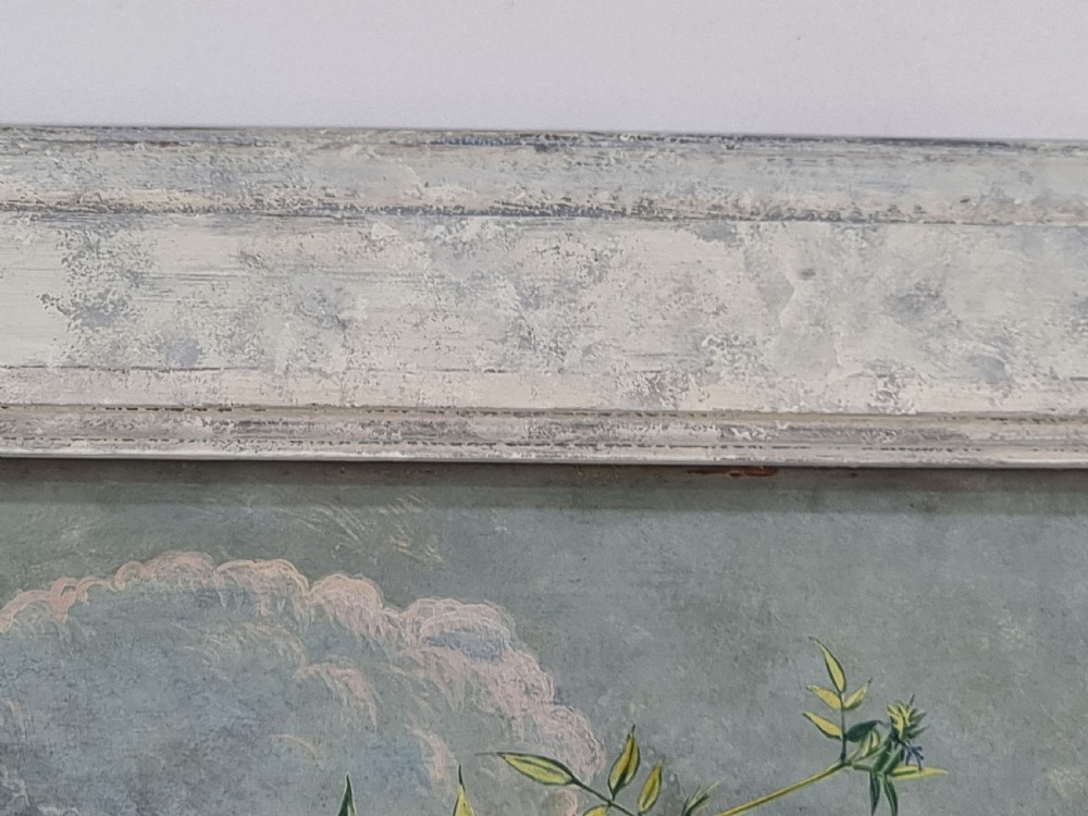A framed mid-century tempera painting depicting a arrangement of red roses, white lilies, and blue flowers in a glass vase on a stone pedestal. View IX