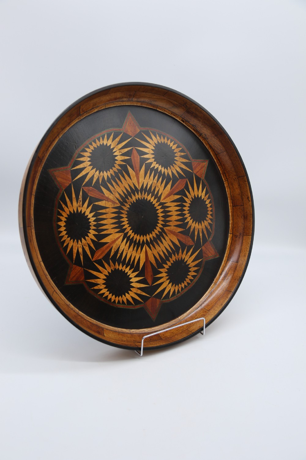 A large late 19th century circular aesthetic movement parquetry tray View III