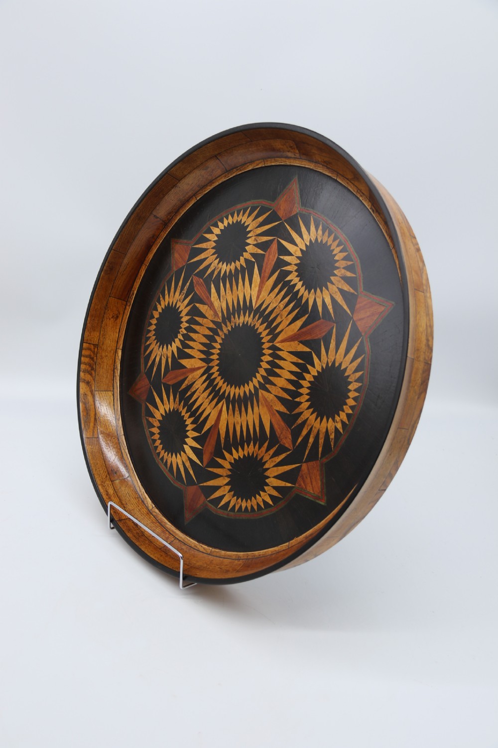 A large late 19th century circular aesthetic movement parquetry tray View IV