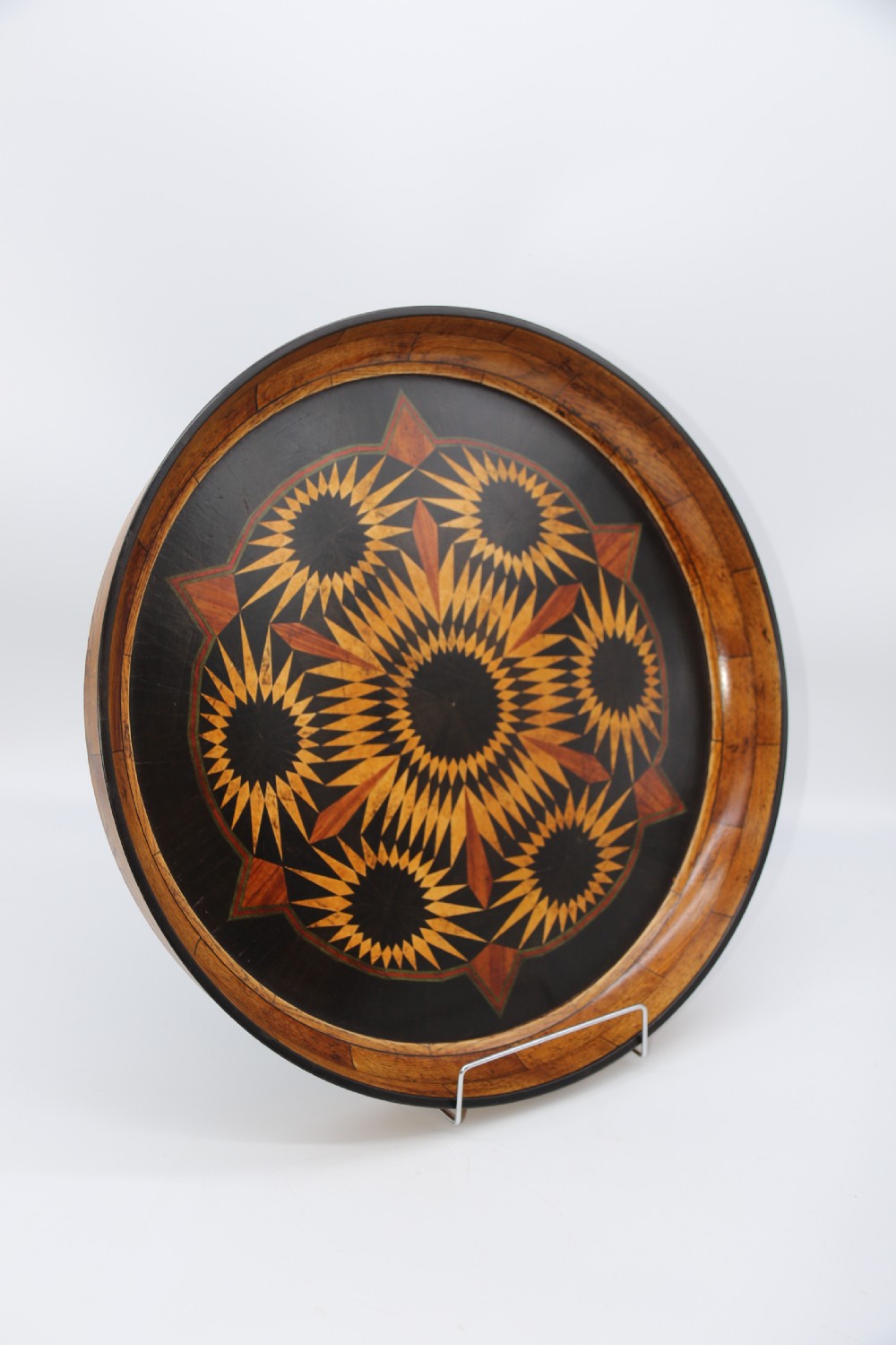 A large late 19th century circular aesthetic movement parquetry tray View V