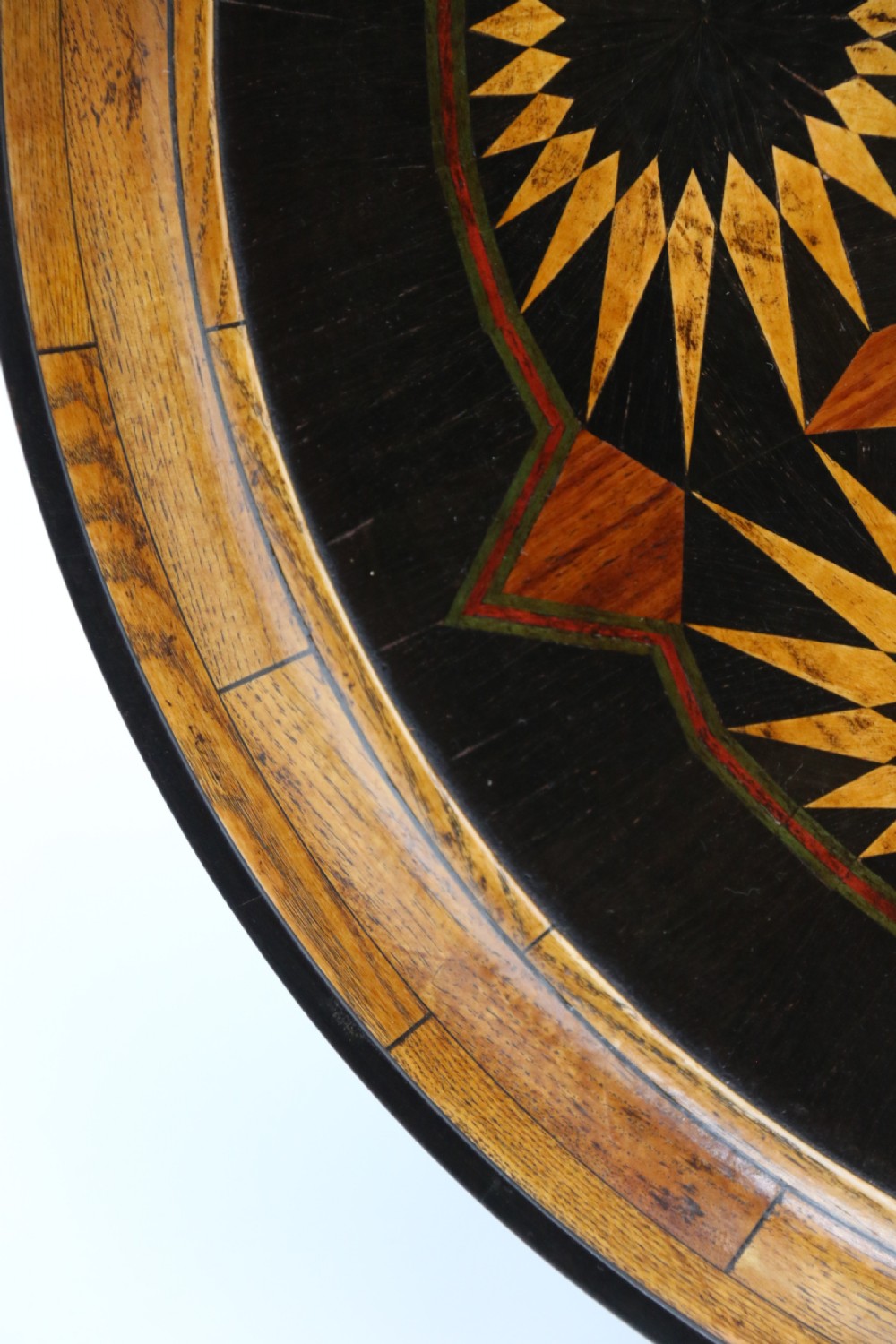 A large late 19th century circular aesthetic movement parquetry tray View X