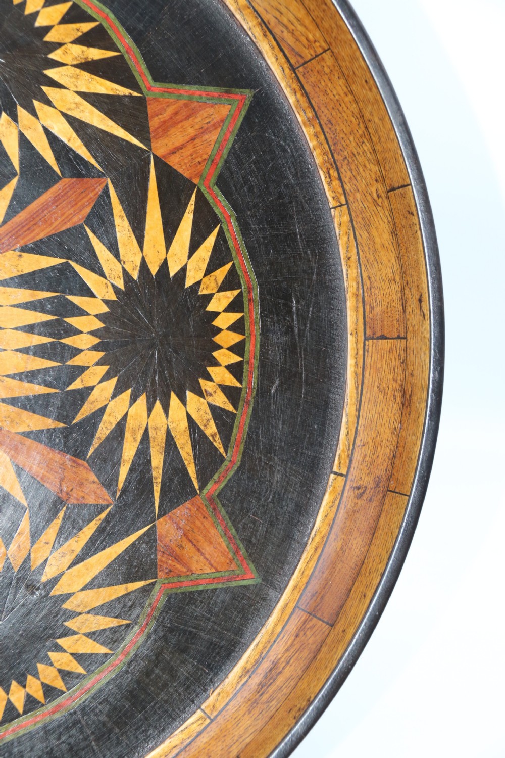 A large late 19th century circular aesthetic movement parquetry tray View XI