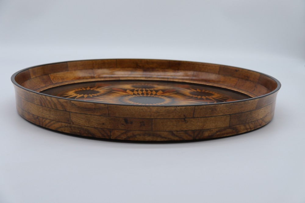 A large late 19th century circular aesthetic movement parquetry tray View XIII