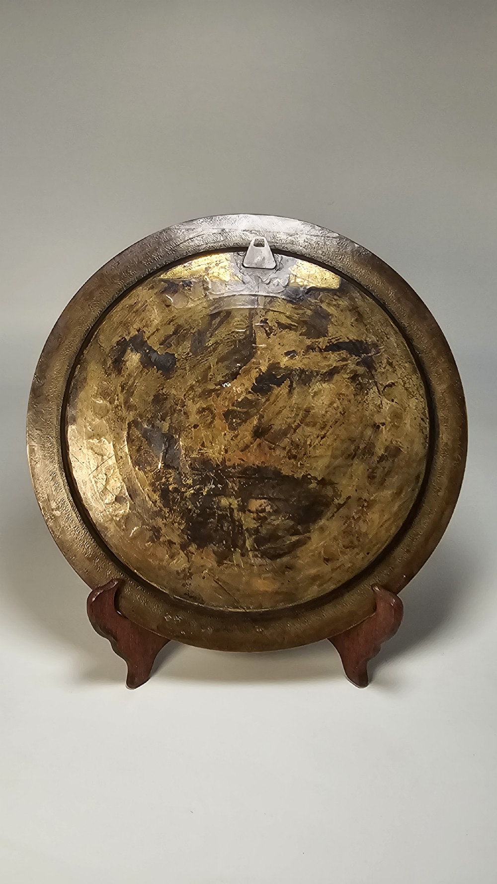 A circular brass charger featuring inlaid silver and copper depiction of Ancient Egyptian figures, hieroglyphs, and winged sun disc motifs. View VIII