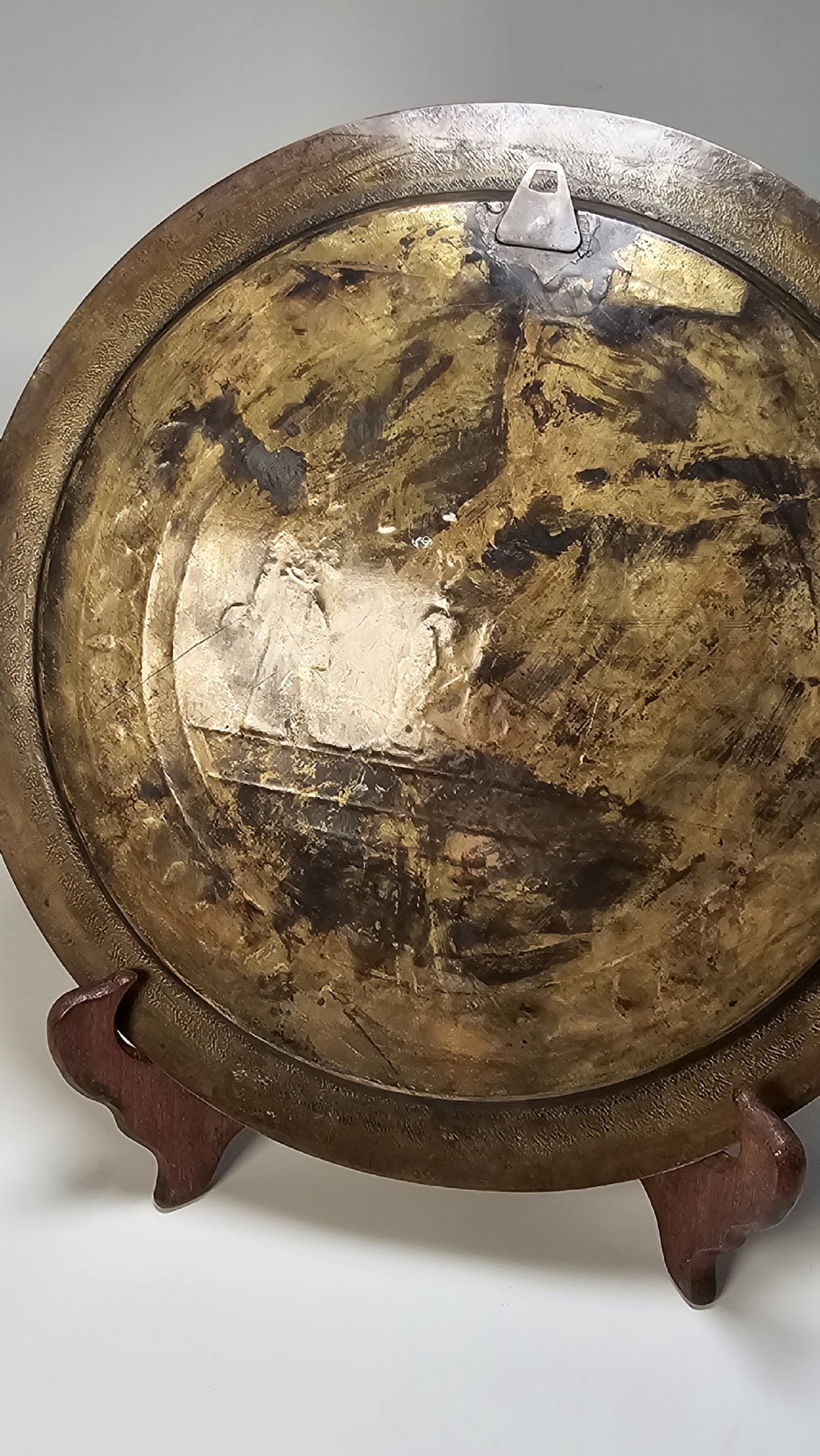 A circular brass charger featuring inlaid silver and copper depiction of Ancient Egyptian figures, hieroglyphs, and winged sun disc motifs. View XIX
