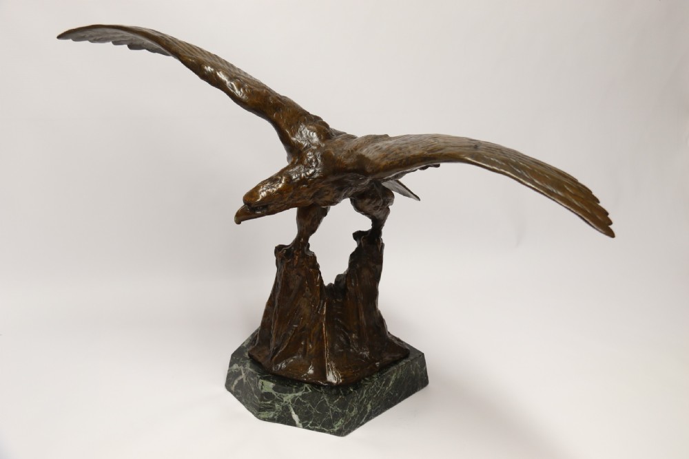 A large and impressive bronze sculpture of a Eagle by Claude Mirval View VII
