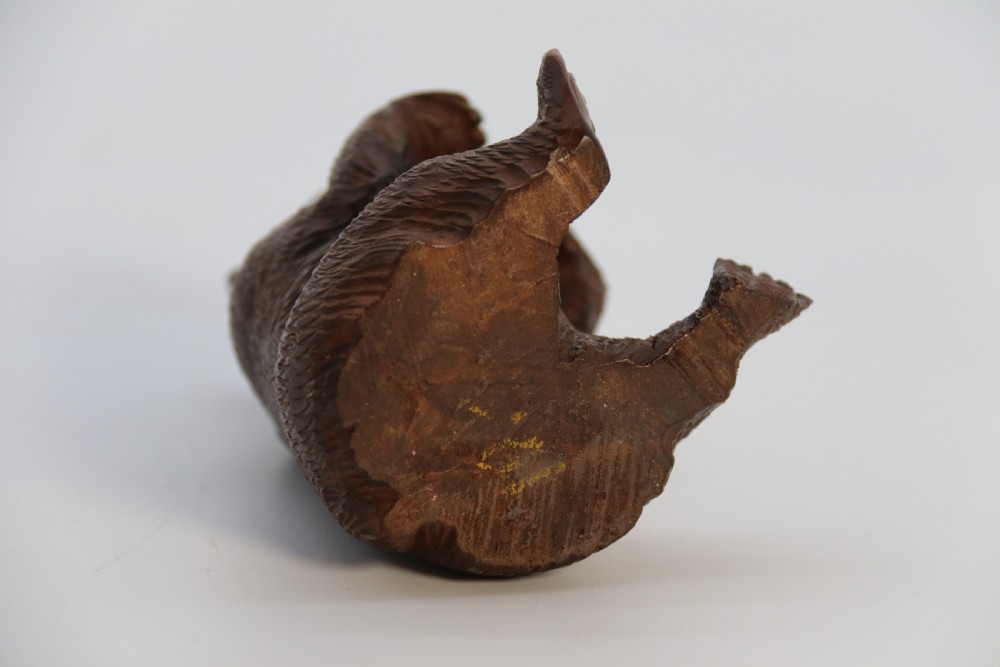 A pair of hand-carved dark brown linden wood Black Forest bears depicted sitting on their haunches with open jaws. View XXXI