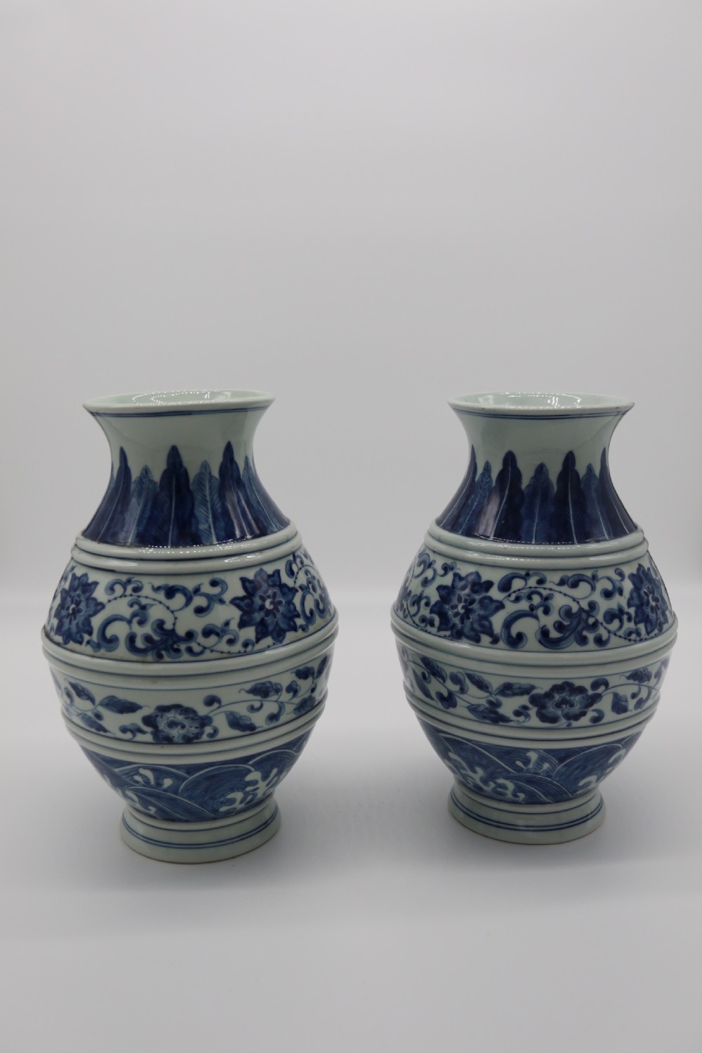 A pair of Chinese hand painted blue and white porcelain vases View II