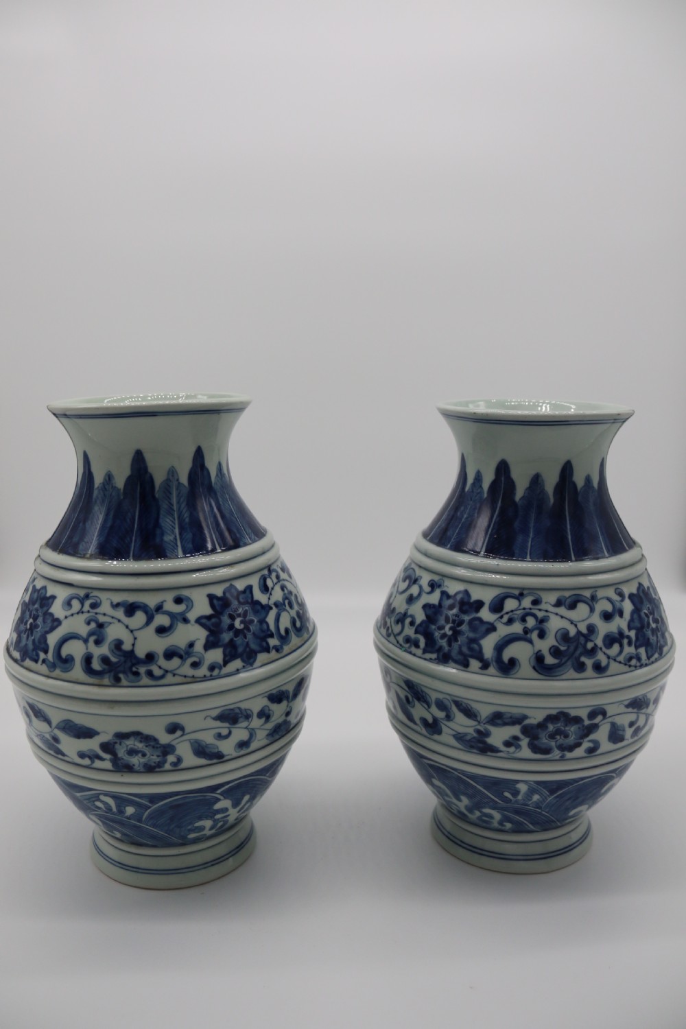 A pair of Chinese hand painted blue and white porcelain vases View III