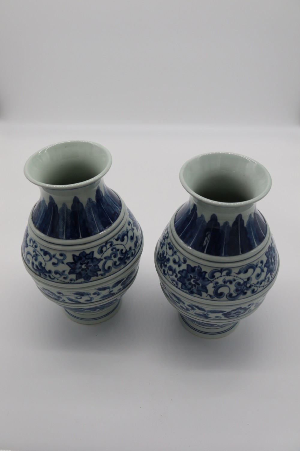 A pair of Chinese hand painted blue and white porcelain vases View XII