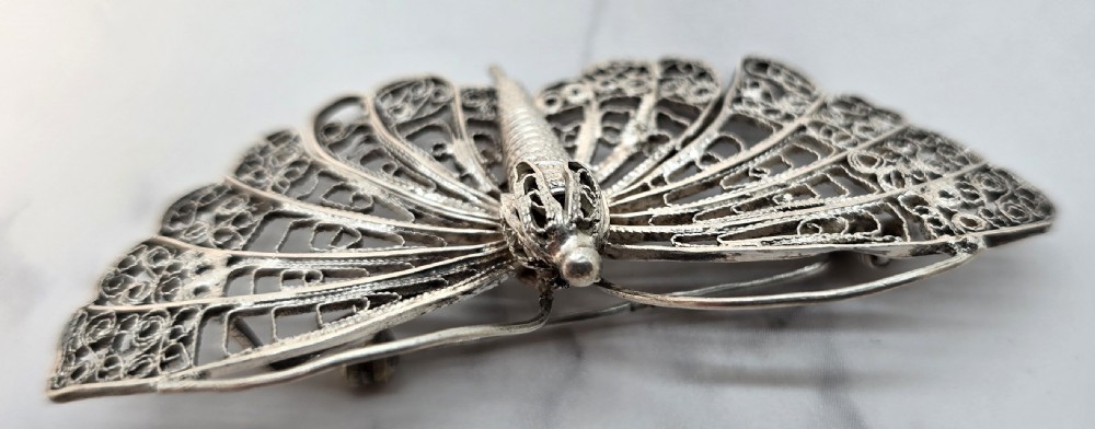 A fine silver filigree butterfly brooch, circa 1930 View VII