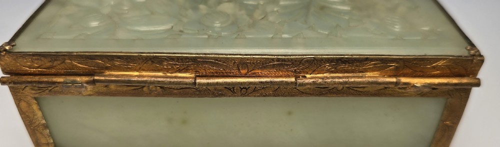 A Chinese carved jade and gilt metal mounted jewellery box View XV