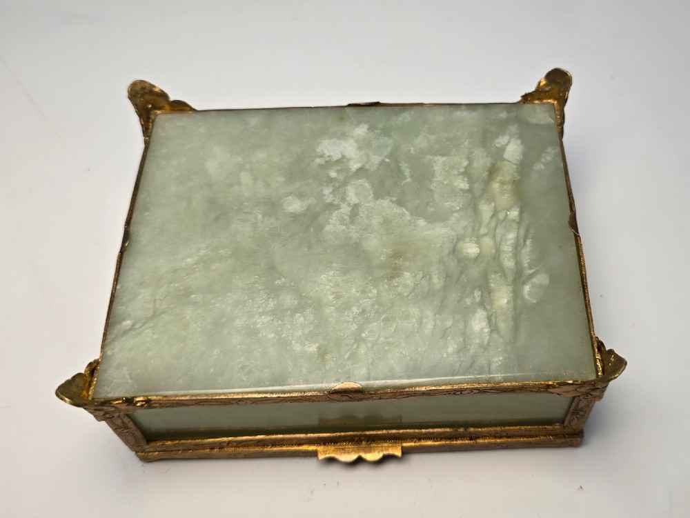 A Chinese carved jade and gilt metal mounted jewellery box View XX