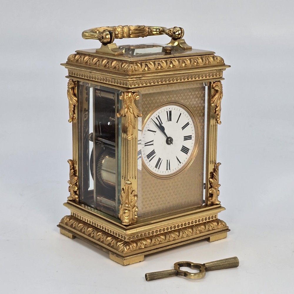 French eight day striking and repeating gilt case carriage clock View III