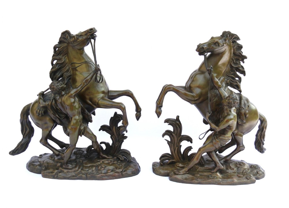 A large pair of 19th century French bronze Marly Horses after Coustou.