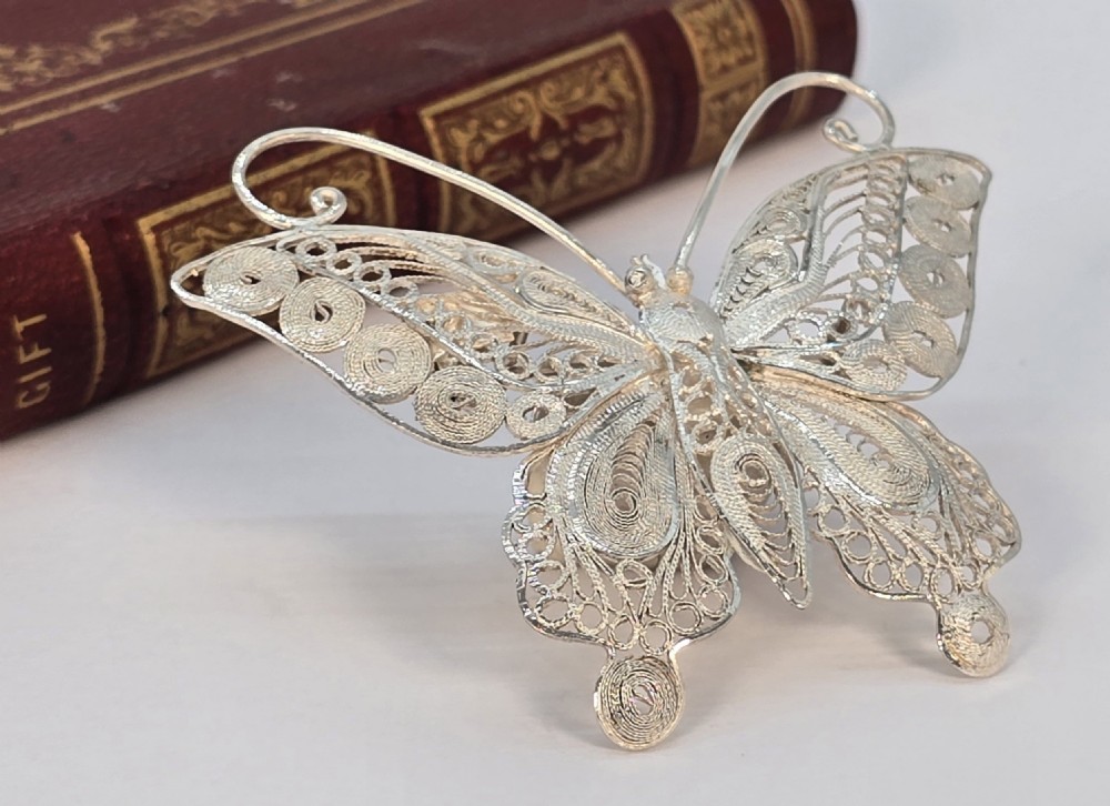 A fine silver filigree butterfly brooch of exceptional quality View X