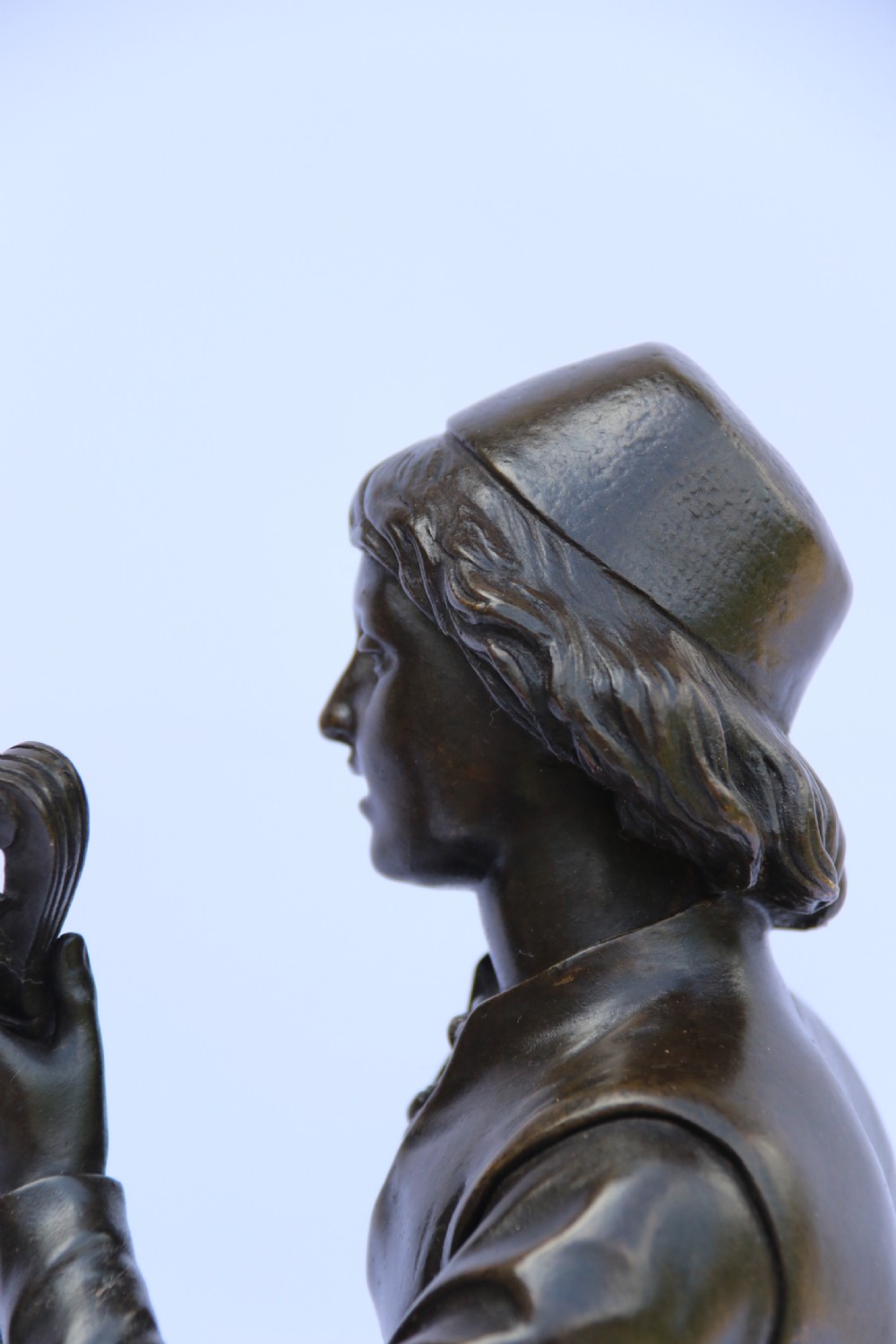  19th century French bronze study of a seated musician playing an early string instrument
 View V